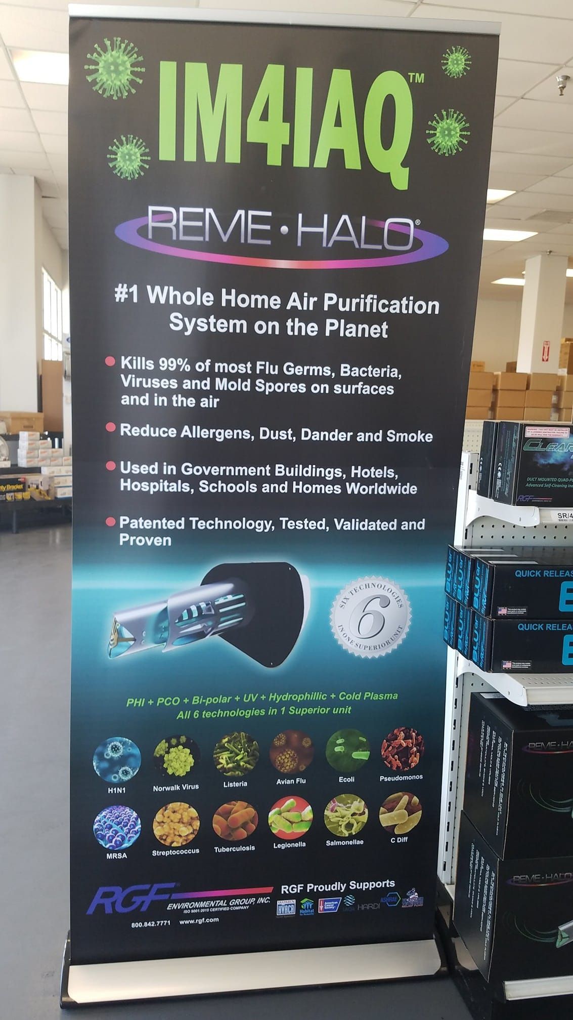 A black sign with the word im4iaq on it