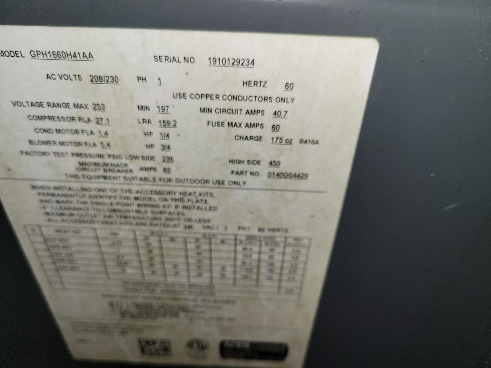 A piece of paper that says serial number on it