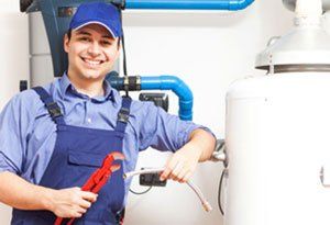 Plumber with a water heater