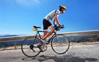 Man riding in a bicycle
