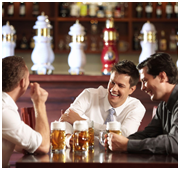 Three men drinking beer