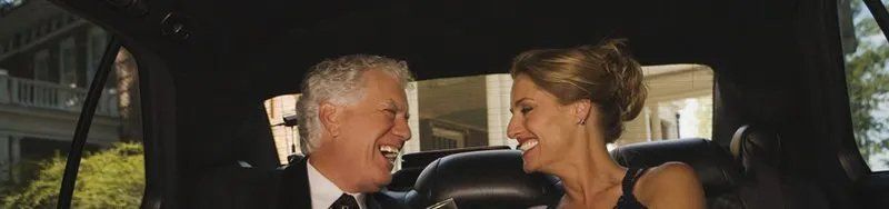 Happy couple in limo