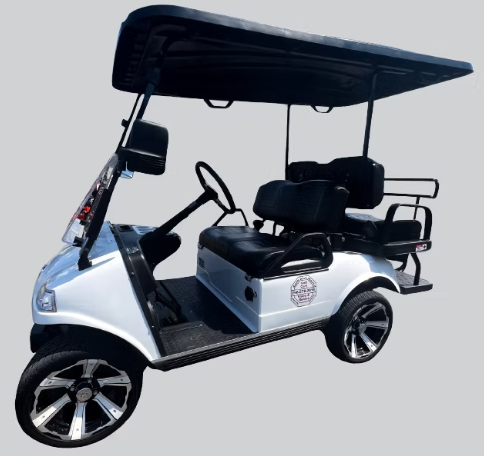 A white four-passenger golf cart with a black roof and silver-spoked wheels, shown against a light gray background.