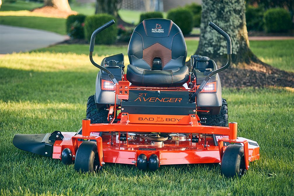 Orange Bad Boy Avenger zero-turn mower on a lawn.