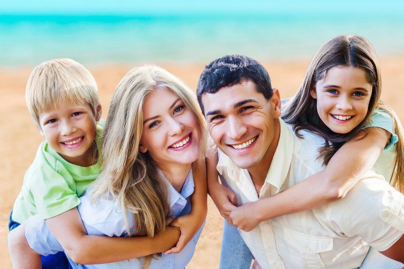 Learn More About General & Family Dentistry happy family