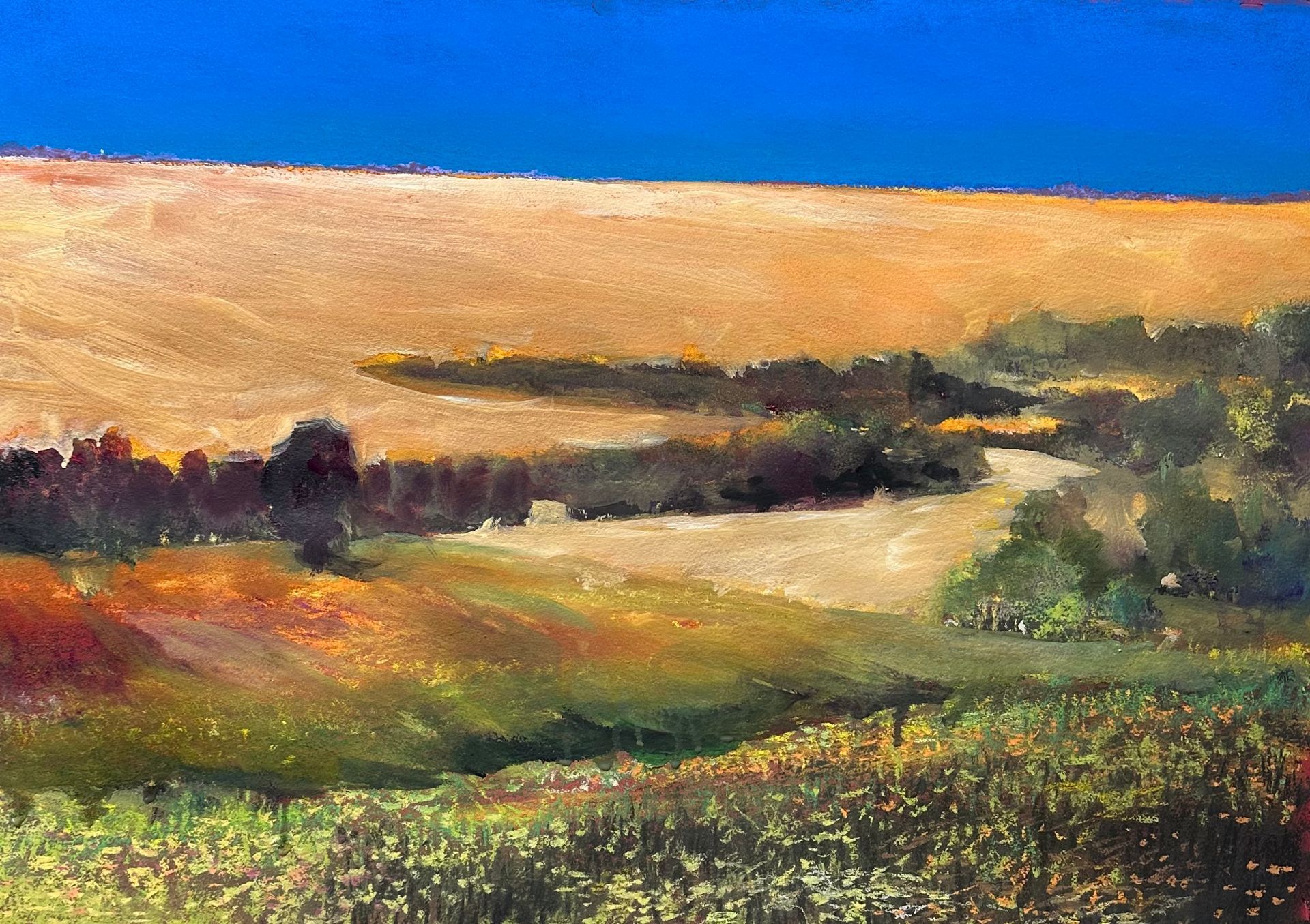 A painting of a field with trees and a blue sky