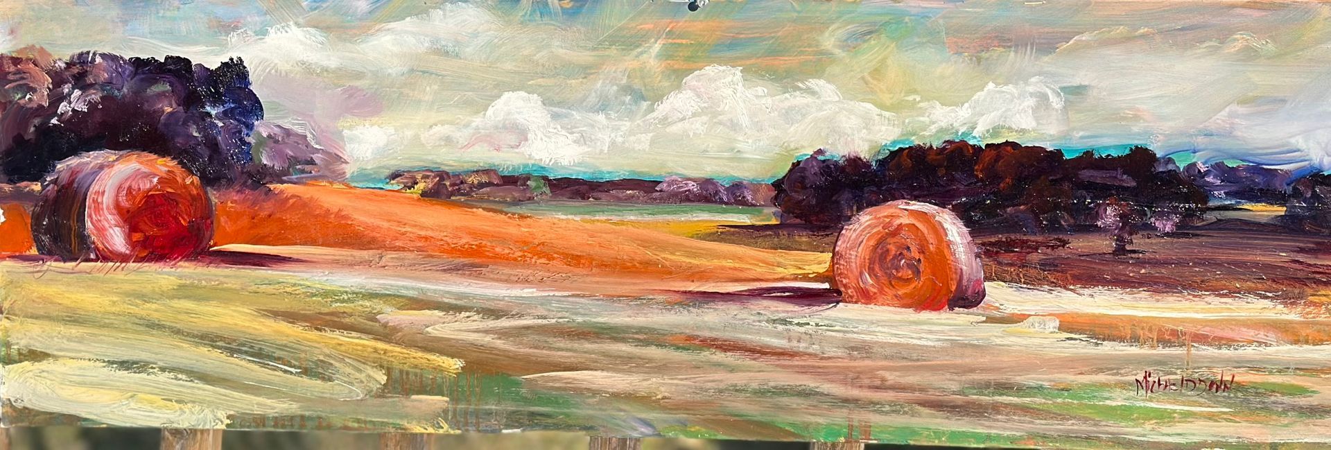 A painting of hay bales in a field with trees in the background.