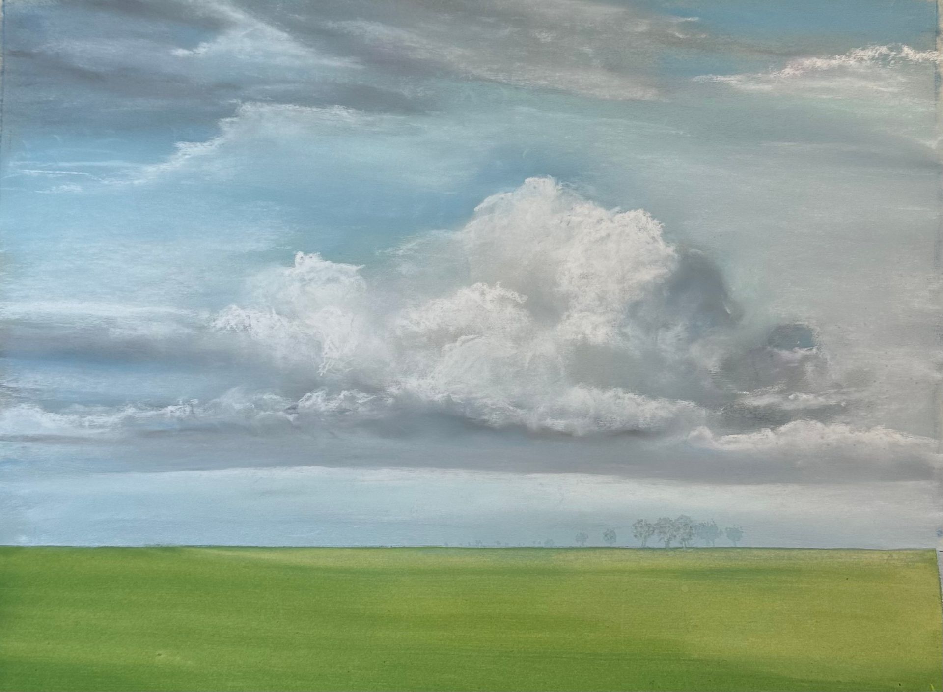 A painting of a cloudy sky over a green field.