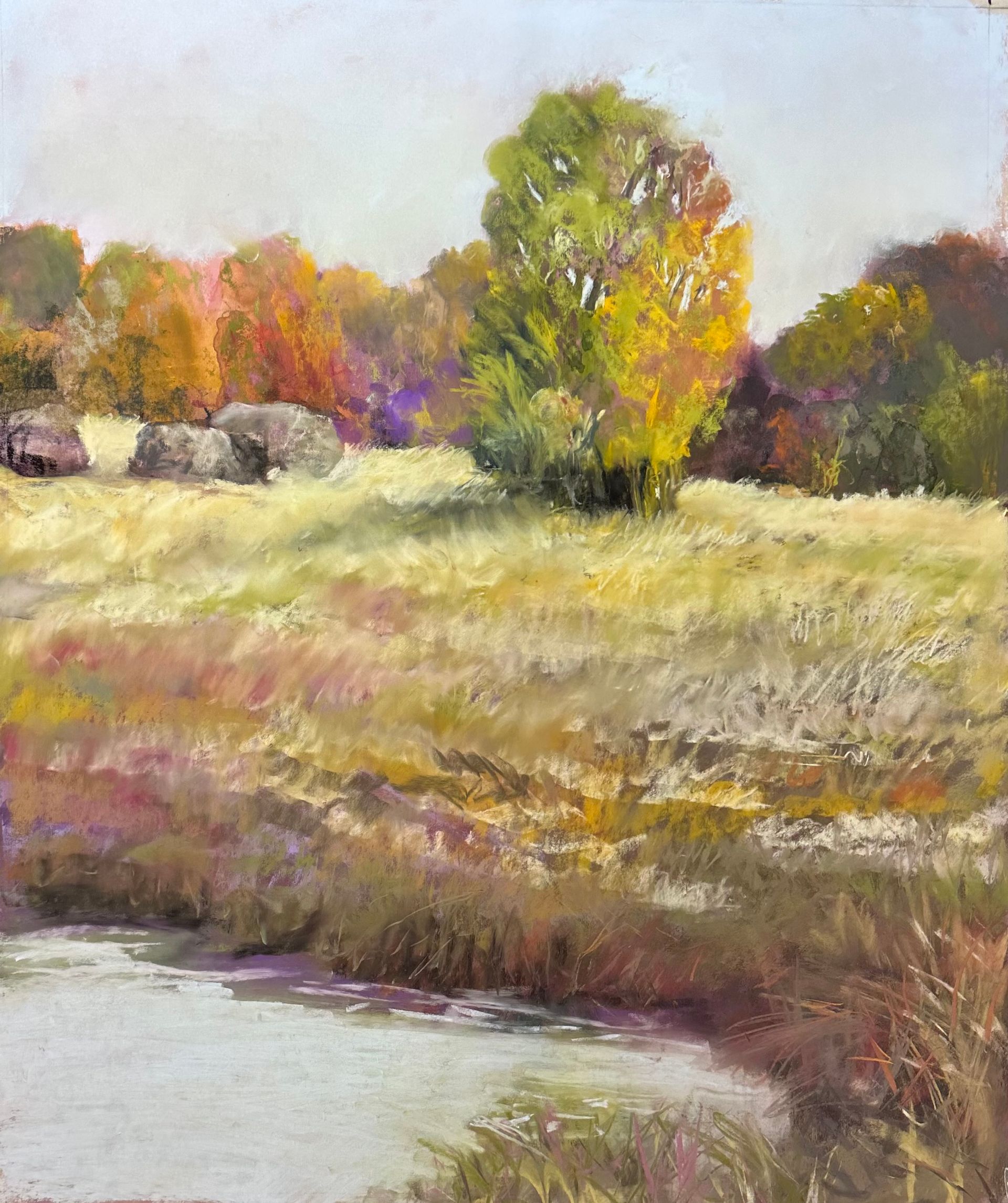 A painting of a river running through a field with trees in the background.