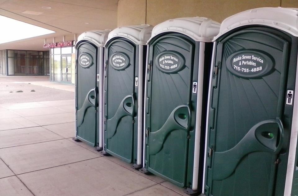 green portable toilets for an establishment