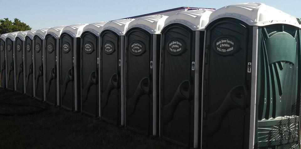 lined up portable toilets