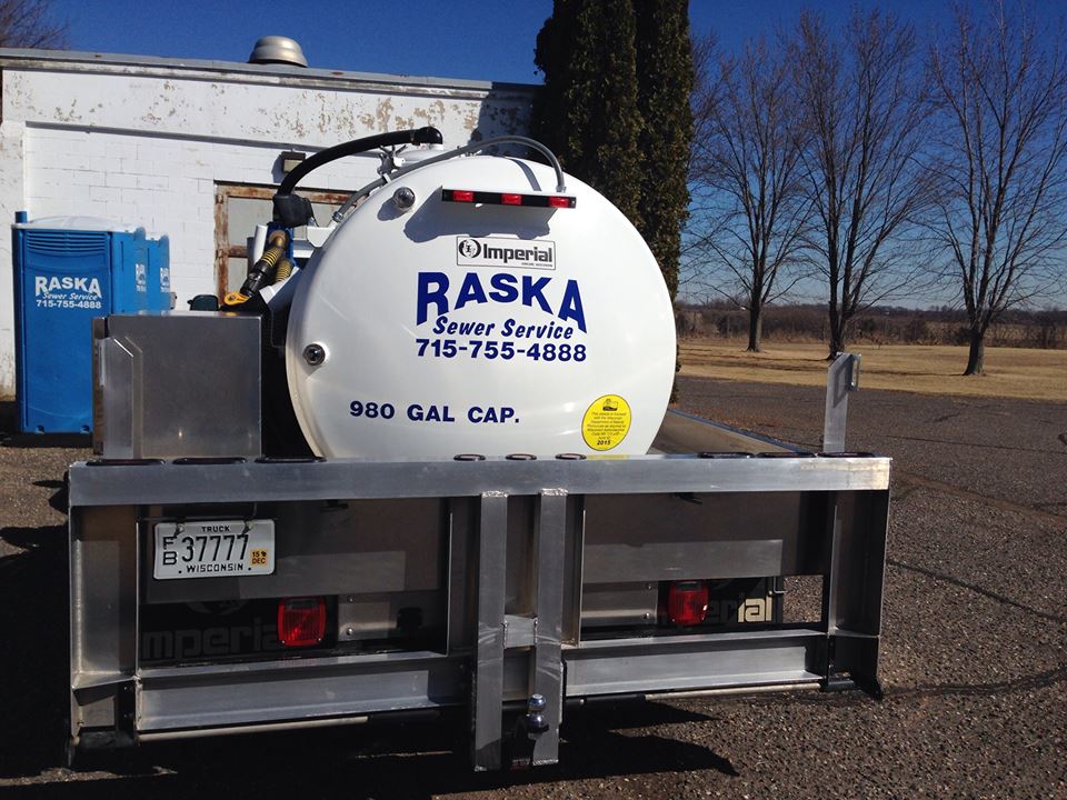 Raska Sewer Service vehicle parked outside