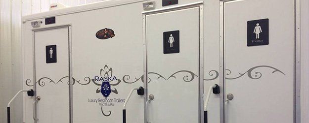 white mobile trailer restroom for men and women