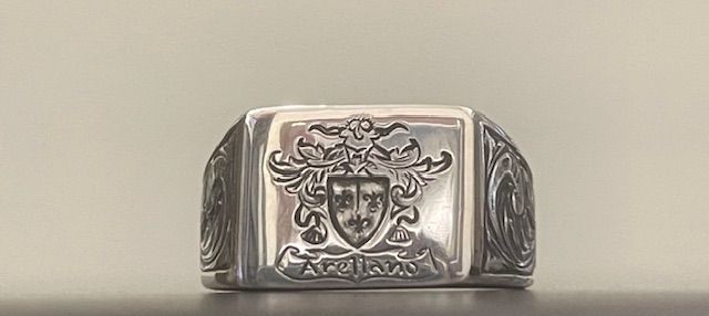 Silver signet ring with family crest and 