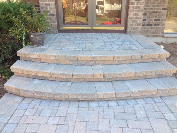 A set of steps leading up to a brick building