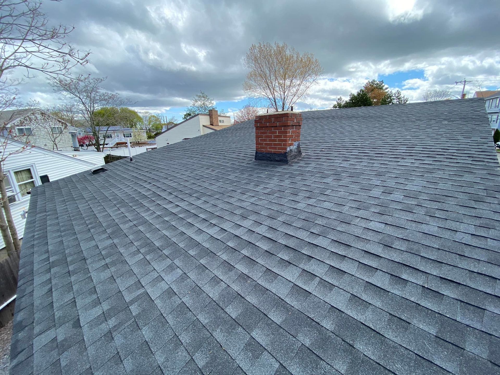 A roof with a chimney on top of it.