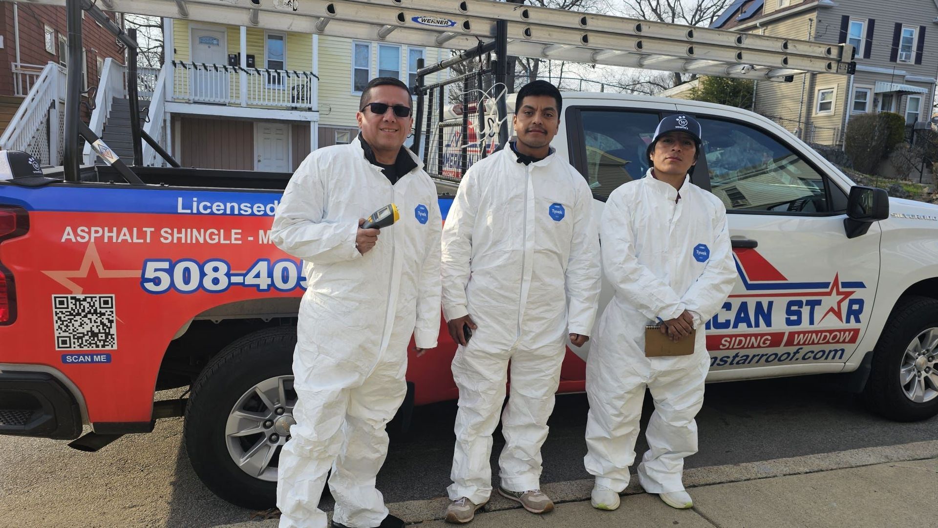 Team in front of truck