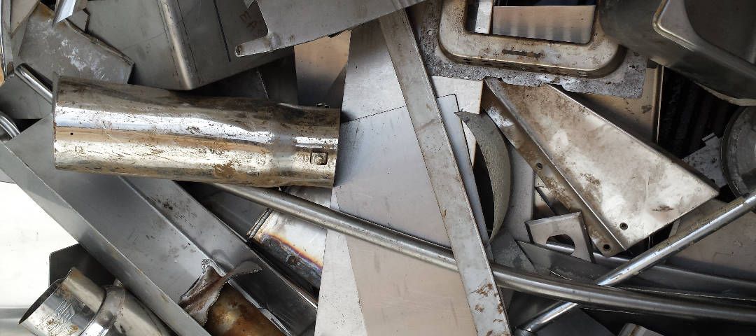 Scrap metal pile with various shapes and textures.