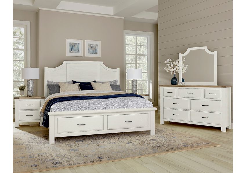 White bedroom furniture set with bed, nightstand, dresser, and mirror.