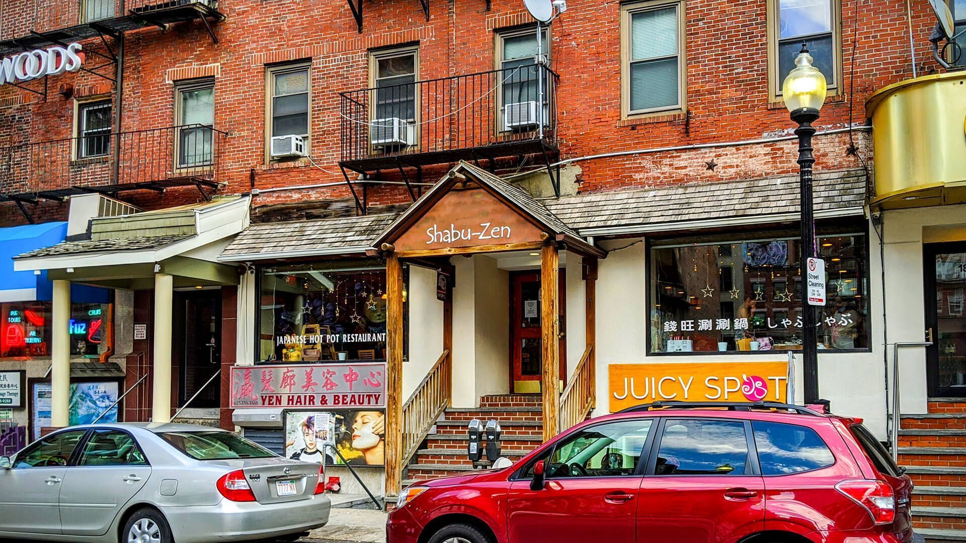 a japanese hot pot restaurant is located in a brick building