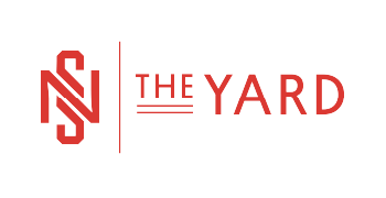 Logo for The Yard with stylized NS in red and text THE YARD in red.