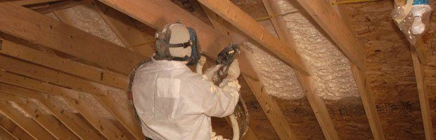 A man performing insulation work
