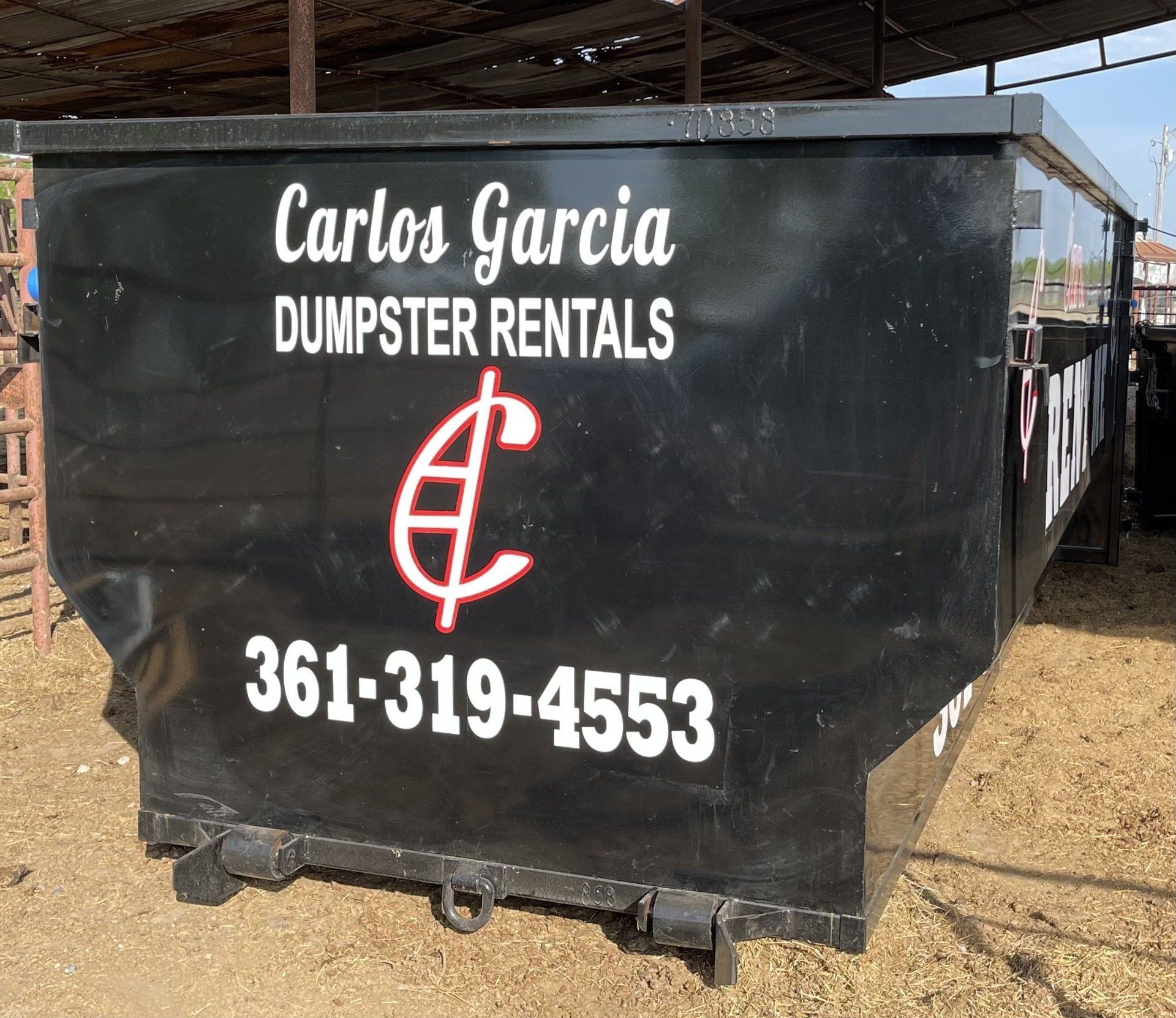 Black dumpster with their logo