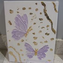 child painting of butterflies with purple wings