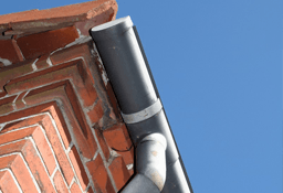 Guttering and drain or rain pipe on house