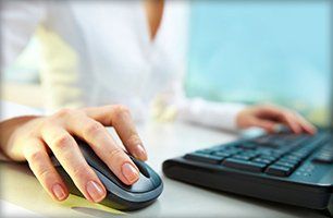 Woman operating the computer