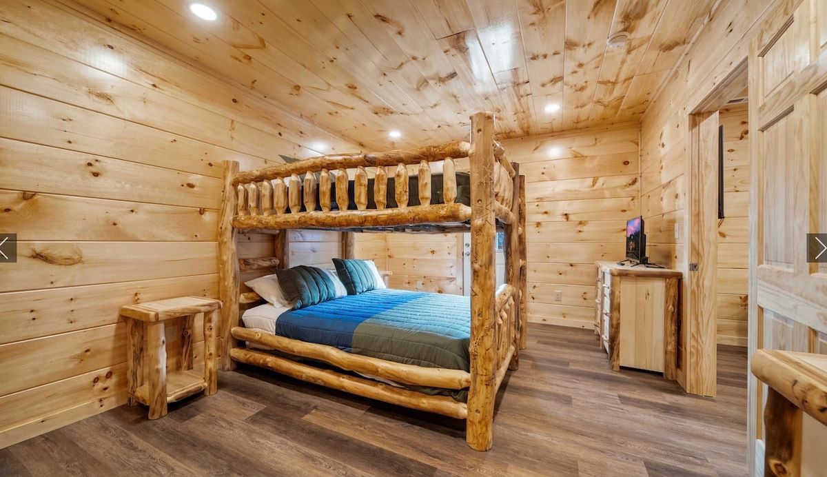 There is a bunk bed in the middle of the room.