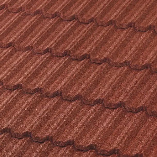 A close-up view of interlocking red stone-coated metal roof tiles featuring a textured, scalloped pattern.