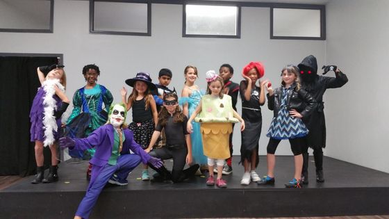 kids at the stage in costumes