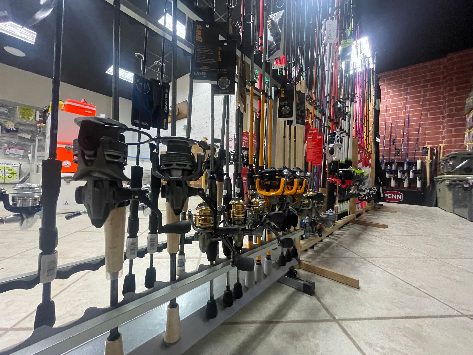 A store filled with lots of fishing rods and reels.
