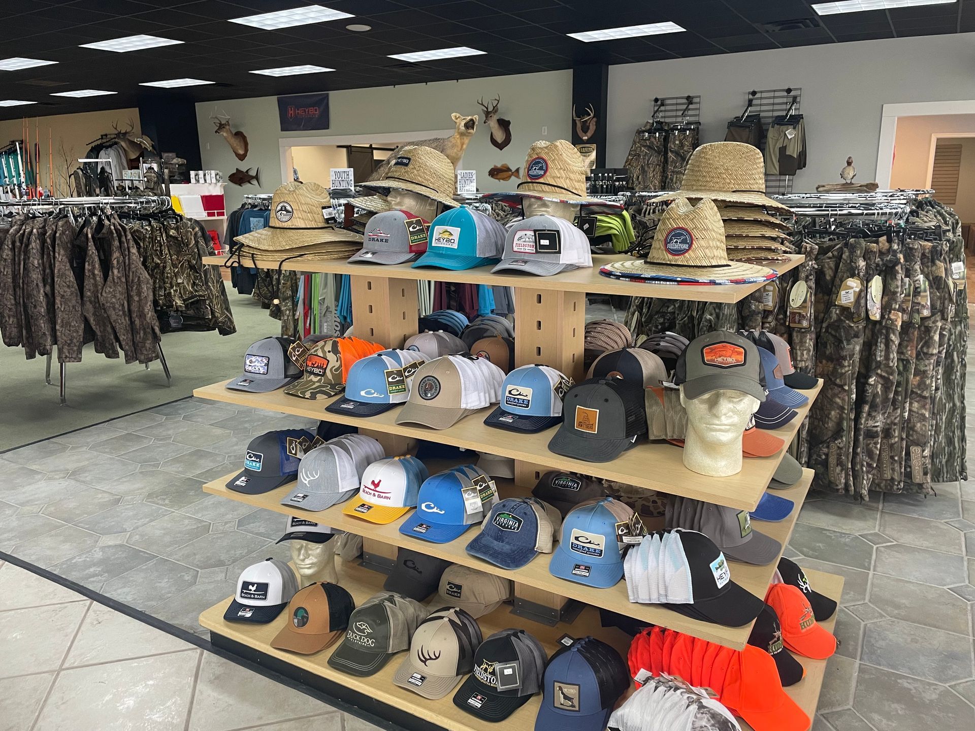 A store filled with lots of hats and jackets.