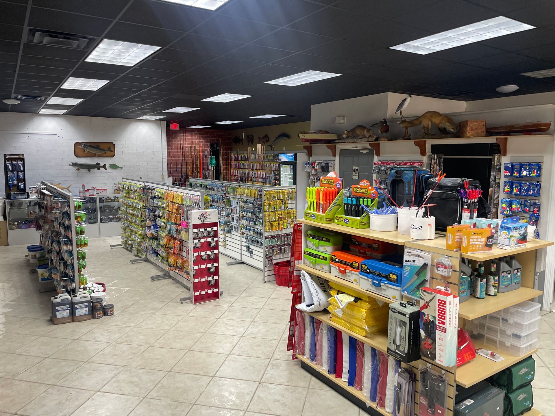 A store filled with lots of shelves filled with lots of items.