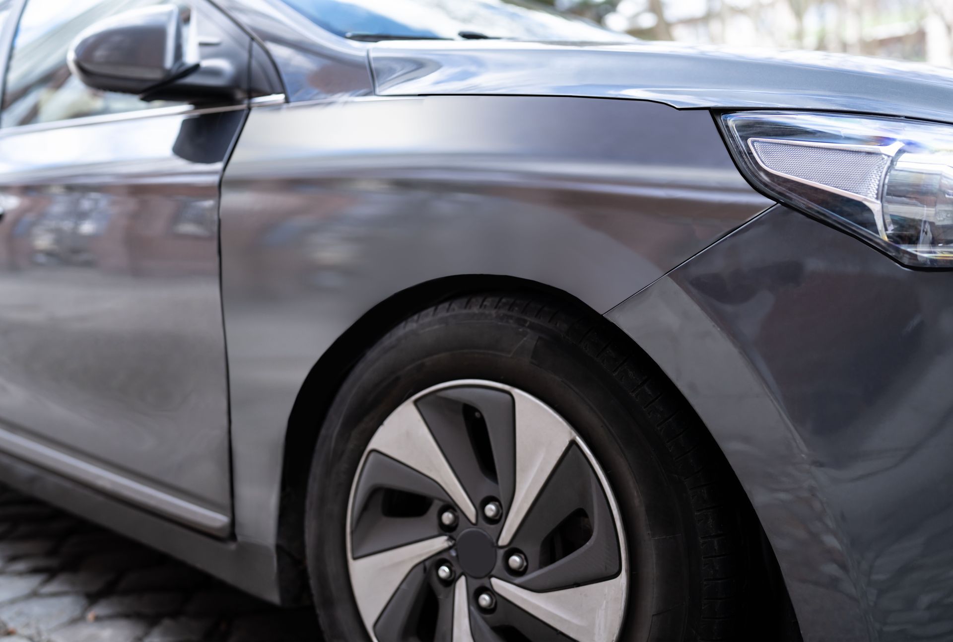 The front of a bmw is shown on a white background