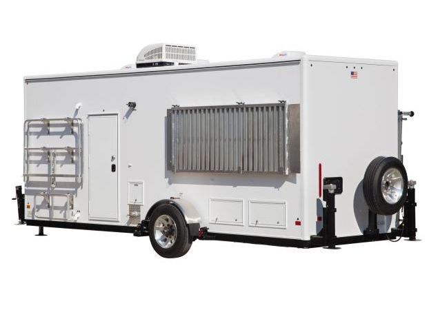 A white portable restroom trailer with a ladder attached to it