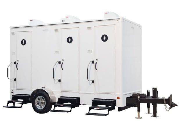 A white luxury portable restroom trailer