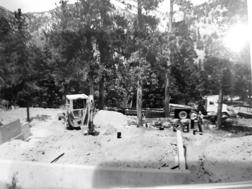 A black and white photo of a construction site