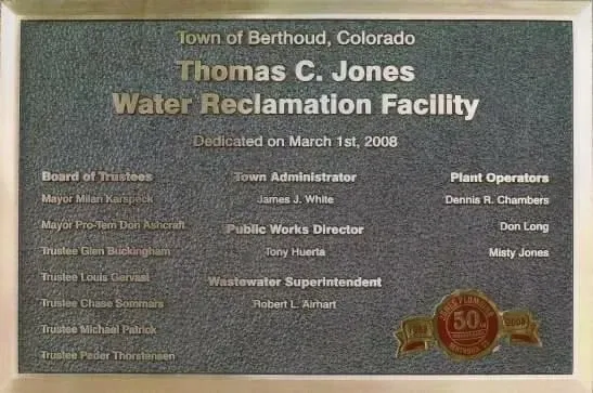 A plaque that says thomas c. jones water reclamation facility