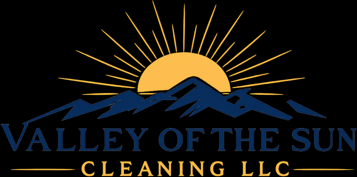 Valley of the Sun College logo with blue mountains, orange sun, and rays on black background