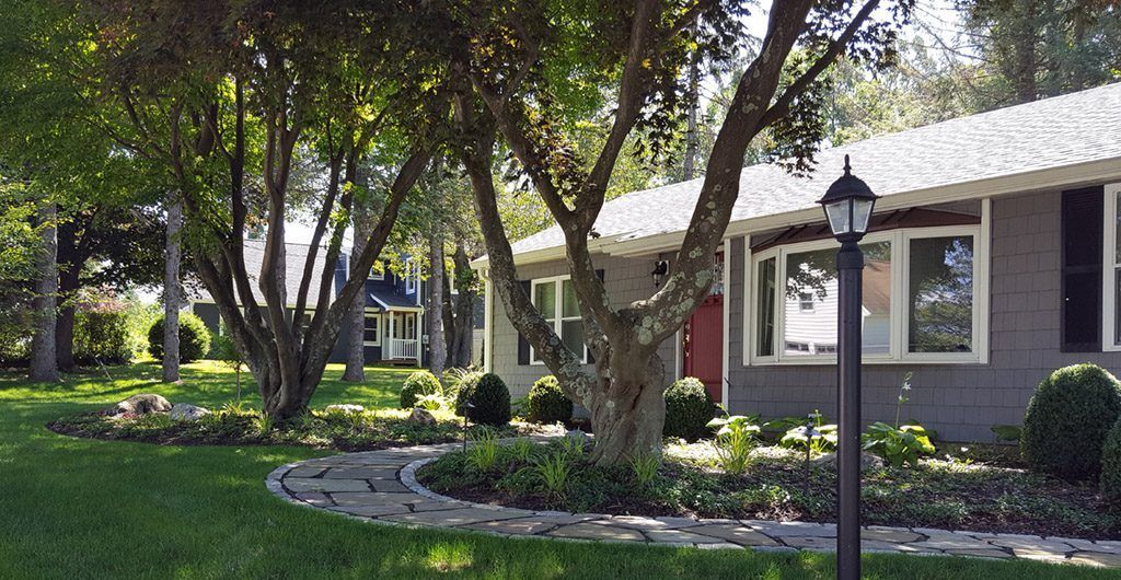 Entrance Stone Walkway, Landscaping, Patio Deck and Storage Shed