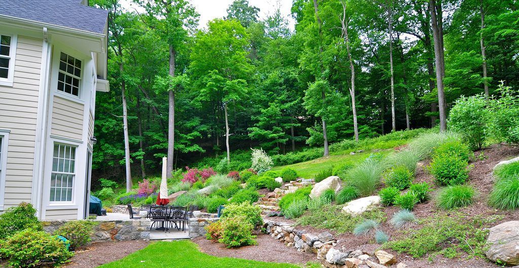 Multi-Level Sloped Rock and Grass Garden