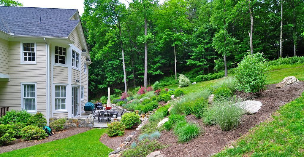 Multi-Level Sloped Rock and Grass Garden