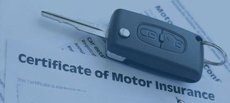 Car key and insurance paperwork