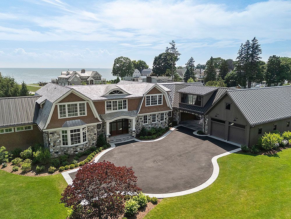 Green palm leaf, close-up detail, radiating lines, sunlight creating shadows.