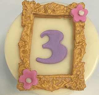 A picture frame with the number 3 on it
