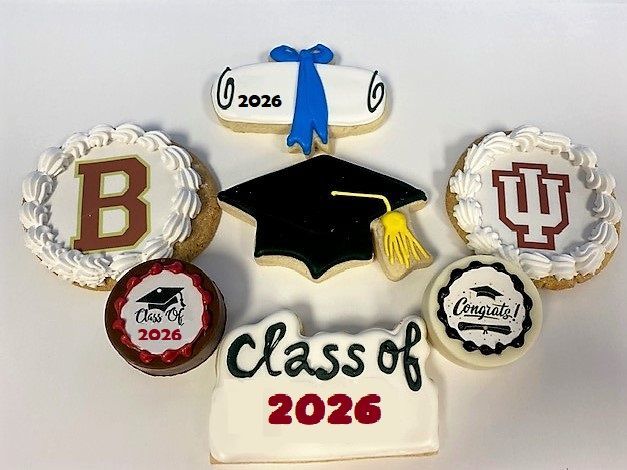 Class of 2026 graduation cookies with cap, gown, and school logos on white background