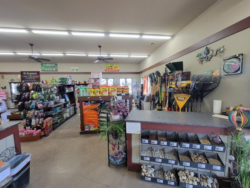 A store filled with lots of shelves and a counter.